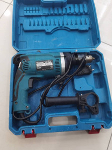 Дриль ударний Makita HP1630