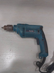 Дриль ударний Makita HP1620
